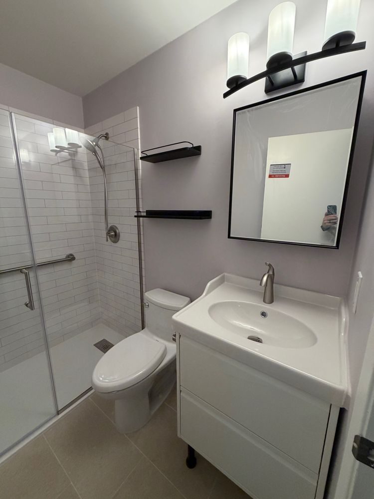 Bathroom remodel: shower, toilet, shelves, lighting, medicine cabinet and vanity