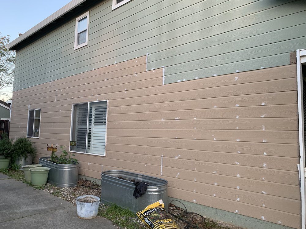 Siding replacement on the side of a house